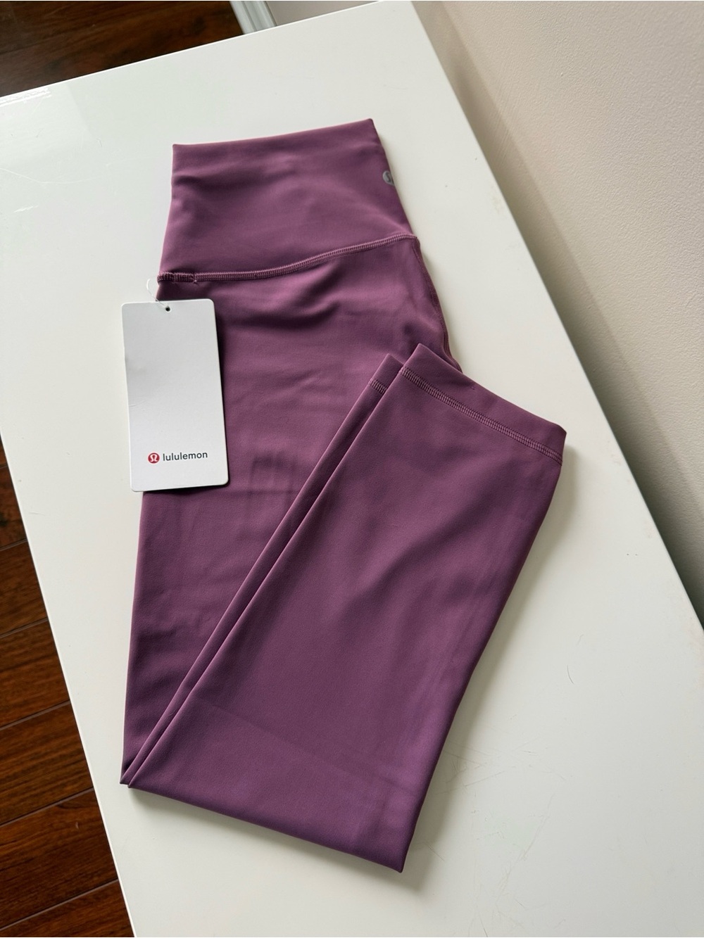 Size 8 Lululemon Wunder Train High-Rise Crop 23"
Vintage Plum